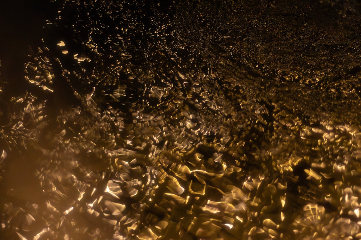 Abstract textured background with golden and dark brown colors